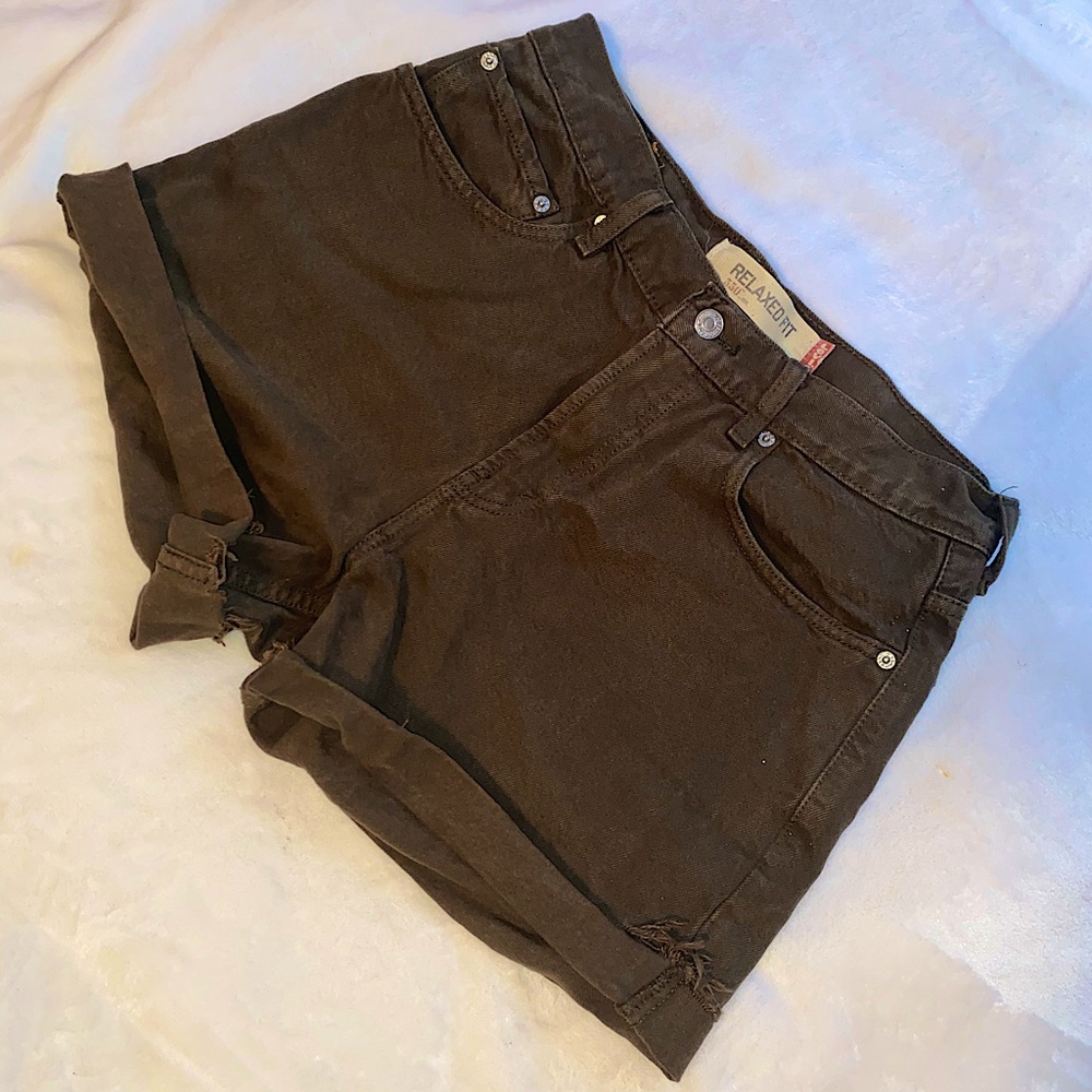Vintage Levi shorts, size 32, mid to upper thigh length.